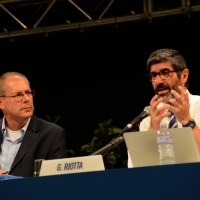 Foto Nicoloro G.   22/08/2015    Rimini  Terza giornata dell\' edizione 2015 del Meeting di C.L. dal titolo \' Di che è mancanza questa mancanza, cuore, che a un tratto ne sei pieno ? \'. nella foto da sinistra Alberto Savorana, portavoce di C.L., e il giornalista Gianni Riotta che hanno partecipato al dibattito dal titolo \' Incontrare don Giussani oggi \'.