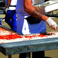 Foto Nicoloro G.  20/06/2015  Milano   Realizzata la pizza più lunga del mondo all' Expo 2015. nella foto la stesura della mozzarella.