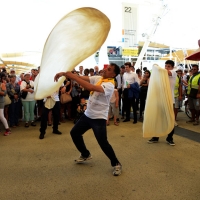 Foto Nicoloro G.  20/06/2015  Milano   Realizzata la pizza più lunga del mondo all' Expo 2015. nella foto esperti pizzaioli si esibiscono in esercizi di abilitÃ  con la pasta per le pizze.