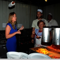 Foto Nicoloro G.  01//09/2014   Ravenna    Festa Provinciale de L' Unità. nella foto il ministro Maria Elena Boschi, dopo l' intervista, visita gli stand gastronomici della Festa con assaggio di specialità.