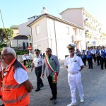 Foto Nicoloro G.   Cervia (RA)   13/06/2022   Festeggiamenti in onore di Sant\' Antonio, protettore dei marinai e dei salinari, con corteo che raggiungera\' il porto da dove la statua del Santo verra\' imbarcata e portata in mare aperto per la tradizionale benedizione e lancio in mare di una corona . nella foto l\' assessore Giovanni Grandu durante la processione.