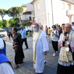Foto Nicoloro G.   Cervia (RA)   13/06/2022   Festeggiamenti in onore di Sant\' Antonio, protettore dei marinai e dei salinari, con corteo che raggiungera\' il porto da dove la statua del Santo verra\' imbarcata e portata in mare aperto per la tradizionale benedizione e lancio in mare di una corona . nella foto durante la processione l\' arcivescovo Lorenzo Ghizzoni, a sinistra, e don Antonio Maffei.