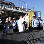 Foto Nicoloro G.   Cervia (RA)   13/06/2022   Festeggiamenti in onore di Sant' Antonio, protettore dei marinai e dei salinari, con corteo che raggiungera' il porto da dove la statua del Santo verra' imbarcata e portata in mare aperto per la tradizionale benedizione e lancio in mare di una corona . nella foto l' arcivescovo Lorenzo Ghizzoni impartisce la benedizione.