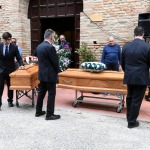 Foto Nicoloro G.   24/05/2023   Localita' San Pancrazio - Russi ( Ravenna ).   Si sono svolti nella Pieve di San Pancrazio i funerali di Stato di due delle 15 vittime accertate in seguito all' alluvione che ha colpito le zone del ravennate. nella foto a fine cerimonia le bare delle due vittime vengono portate fuori.