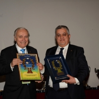 Foto Nicoloro G.  04/12/2013  Milano   Trentunesima edizione del '' Milano International Ficts Fest ''. nella foto il presidente FICTS Franco Ascani consegna la Ghirlanda d' Onore il presidente della Granarolo Gianpiero Calzolari.