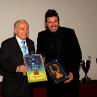 Foto Nicoloro G.  04/12/2013  Milano   Trentunesima edizione del '' Milano International Ficts Fest ''. nella foto il presidente FICTS Franco Ascani consegna la Ghirlanda d' Onore all' ex calciatore Vincent Candela.
