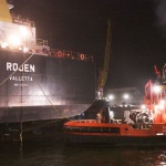 Foto Nicoloro G.   17/08/2022   Ravenna    La nave Rojen, la prima arrivata dall' Ucraina, dall' inizio della guerra, con un carico di mais per la zootecnia, ha terminato le operazioni di scarico e riparte dal porto di Ravenna. nella foto l' imbarcazione ' pilotina ' che accompagnera' la Rojen fuori dal porto di Ravenna.