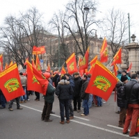 Foto Nicoloro G. 28/01/2011 Milano Corteo dei metalmeccanici per lo sciopero nazionale della Fiom. nella foto Manifestanti con bandiere e striscioni