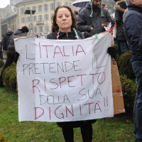 Foto Nicoloro G. 13/02/2011 Milano Manifestazione delle donne " Se non ora quando ? " per la dignita' del soggetto donna e contro Berlusconi. nella foto Manifestante con cartello di protesta