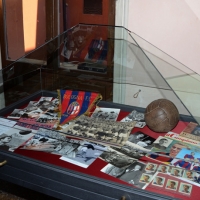 Foto Nicoloro G. 02/09/2013 San Giovanni Persiceto ( Bologna ) Inaugurazione della mostra ” I numeri 10 ” con cimeli, foto e maglie originali appartenute ai più rappresentativi calciatori che hanno ricoperto questo ruolo. nella foto Bacheca con cimeli del Bologna F.C.    