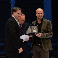 Foto Nicoloro G.  01/12/2013  Ravenna   Quarantaduesima edizione del " Premio Guidarello per il Giornalismo d' Autore "  organizzato dalla Confindustria Ravenna. nella foto il regista Thomas Cicognani, vincitore del premio per la sezione Audiovisivi, a destra, premiato dal sindaco di Forlì Roberto Balzani.