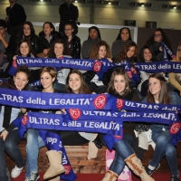 Foto Nicoloro G. Rimini 02/12/2010 Giornata inaugurale della Seconda edizione del ” Salone della Giustizia ” che si svolge dal 02 al 05 dicembre alla Fiera di Rimini. nella foto Giovani studentesse con la sciarpa "ultras per la legalità"