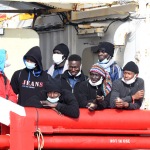 Foto Nicoloro G.   18/02/2023   Porto Corsini ( Ravenna )   La nave Ocean Viking dell\' Ong Sos Mediterranee e\' sbarcata con a bordo 84 naufraghi di cui 58 minori non accompagnati e 26 uomini adulti. nella foto alcuni migranti in attesa di essere sbarcati.