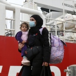 Foto Nicoloro G.  10/04/2024    Ravenna   E\' approdata alla banchina di Marina di Ravenna la nave Ong Life Support con a bordo 200 migranti, dei quali 167 sono uomini, 15 sono donne e 18 minori di cui 8 non accompagnati. I paesi di provenienza dei migranti sono il Bangladesh, la Siria, il Pakistan, l\'  Eritrea, l\' Egitto e il Ghana. nella foto sono una decina le famiglie con minori al seguito.