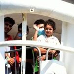 Foto Nicoloro G.   31/08/2024   Ravenna   E\' attraccata al porto di Ravenna la nave ong di Emergency \'\' Life Support \'\' con a bordo 170 migranti provenienti soprattutto dalla Siria 77 e dal Bangladesch 69. I rimanenti provenienti dal Pakistan, dall\' Egitto, dal Sud Sudan, dall\' Eritrea, dalla Palestina e dalla Nigeria. Tra tutti solo due donne e undici minori di cui nove non accompagnati. nella foto a bordo in attesa di sbarcare.