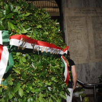 Foto Nicoloro G.  02/08/2010 Bologna  Per il XXX anniversario della strage alla stazione di Bologna si è svolto il tradizionale corteo che si è concluso nel piazzale antistante la stazione con un comizio cui hanno partecipato le massime autorità civili e amministrative oltre all’associazione dei famigliari delle vittime. nella foto La corona di fiori del Governo La lapide con i nomi delle vittime della strage